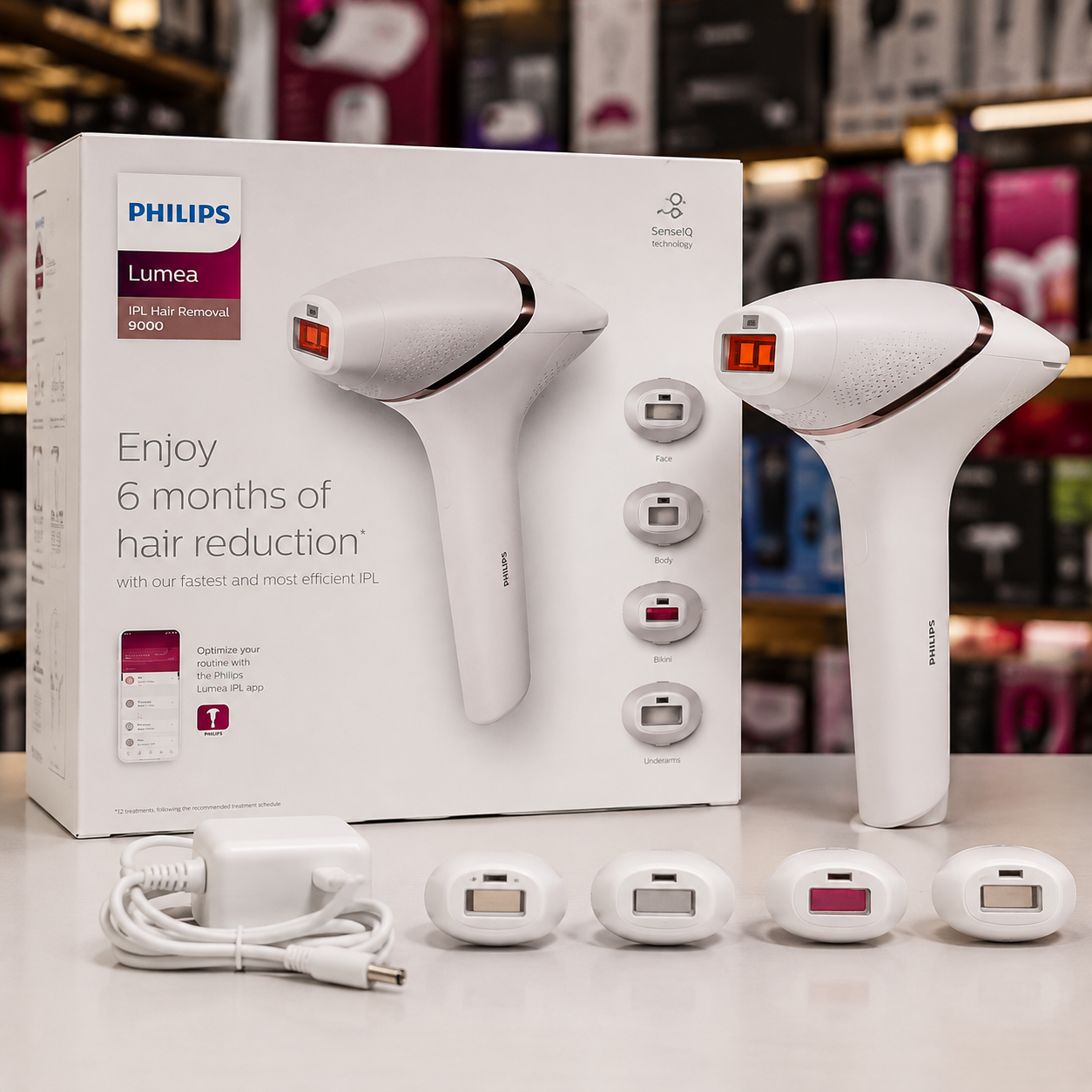 Philips Lumea IPL 9000 hair removal device with original box and attachments