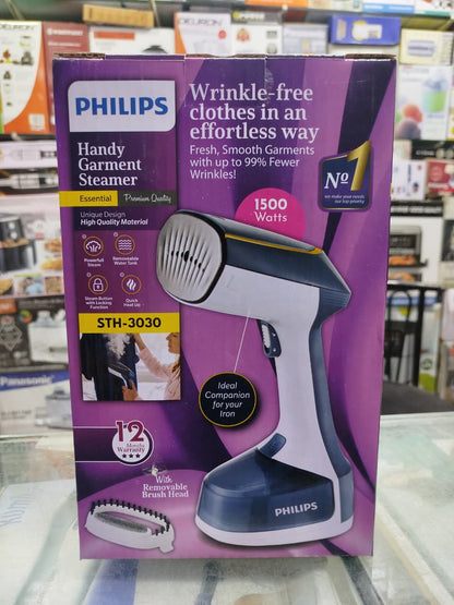 Philips handheld clothes steamer with removable water tank.