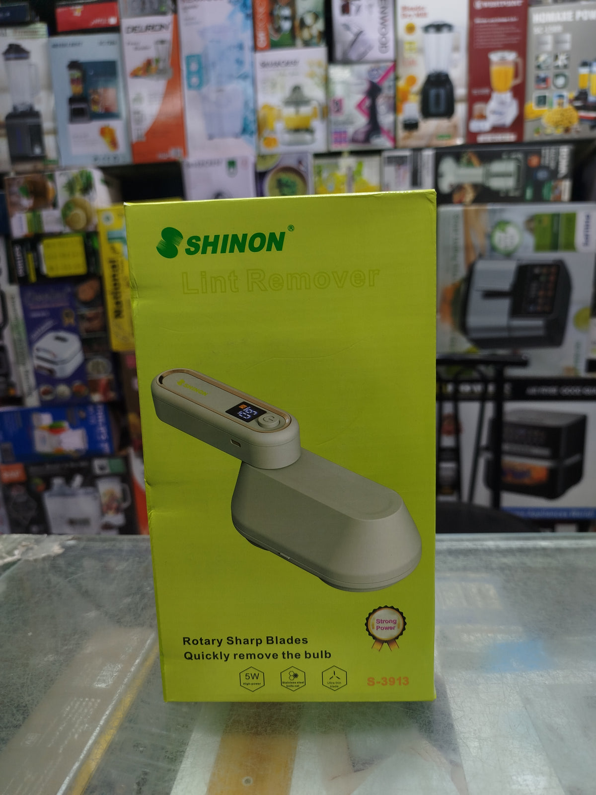 SHINON S-3913 double head lint remover and fabric shaver removing lint from clothes