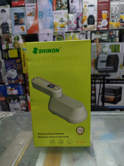 SHINON S-3913 double head lint remover and fabric shaver removing lint from clothes